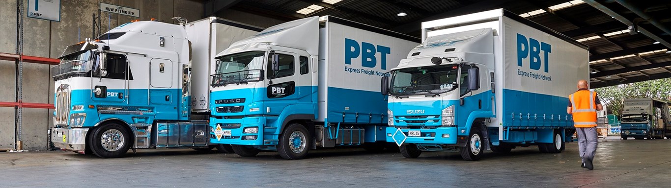 PBT trucks in their warehouse. 