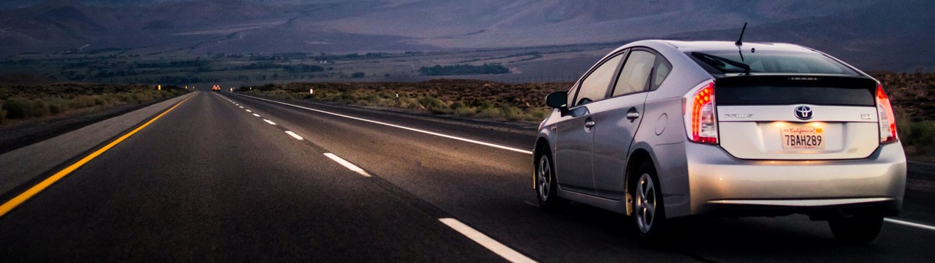 Toyota Prius driving on a lonely motorway.