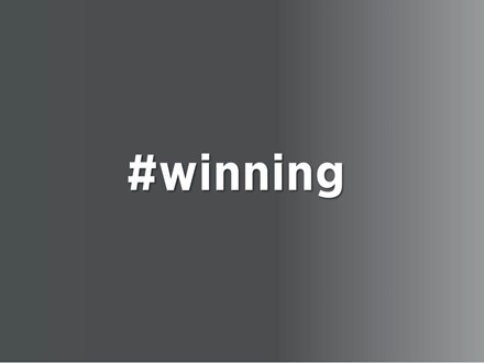 Grey background with "#winning"