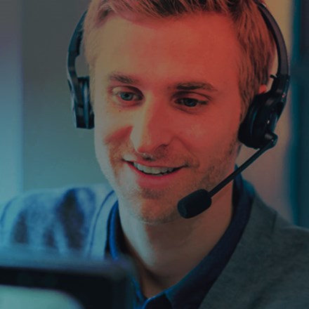 Call centre worker with headset.